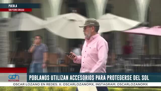 Poblanos ocupan gorras y sombreros para protegerse del sol