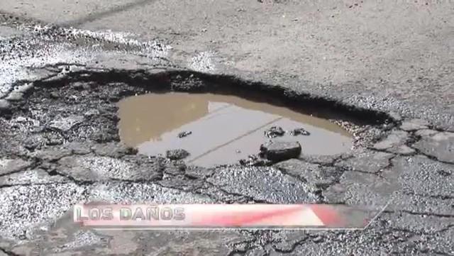 Baches en Huejotzingo convierten avenida Alba en riesgo vial constante