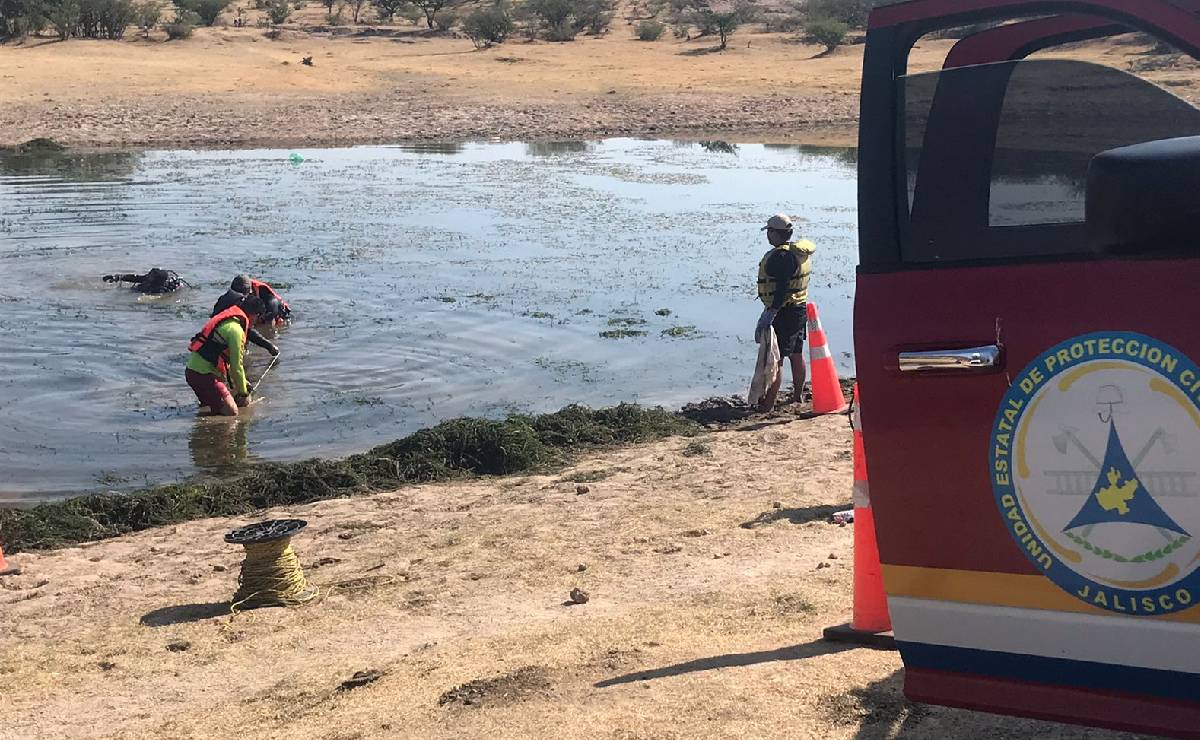 Abuelito y adolescente mueren ahogados en presa de Jalisco
