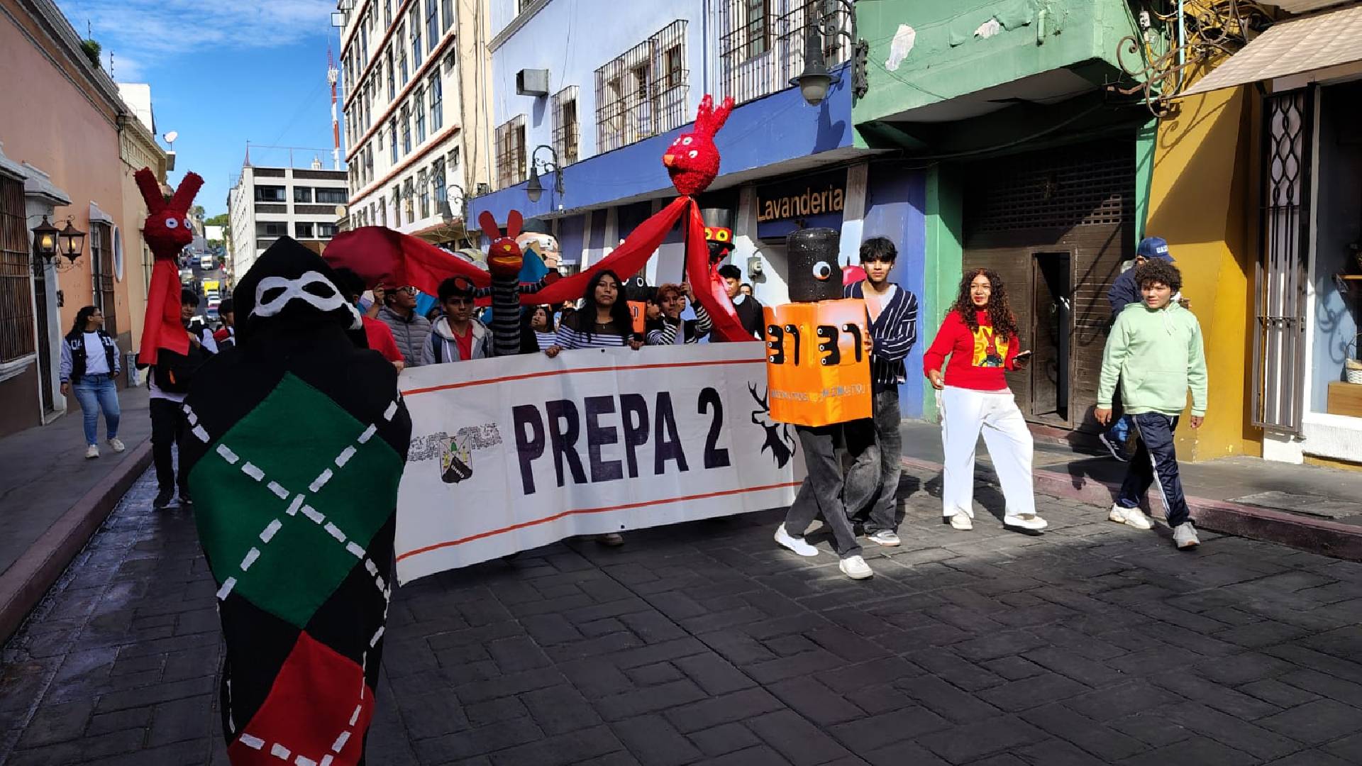Estudiantes de Morelos rinden tributo a 31 Minutos durante marcha por ...