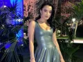 Amina Muaddi con vestido de piel..jpg