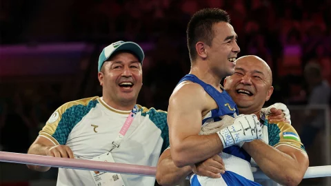 Tulkin Kilichev y Hasanboy Dusmatov