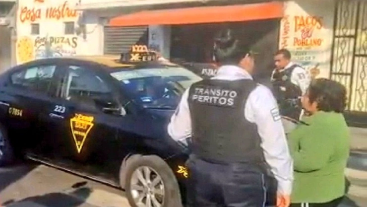 Taxi arrolla a niño en calle de San Baltazar Campeche, Puebla