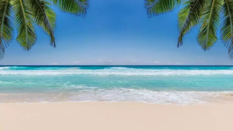 una vista fant&aacute;stica de arena sol y mar