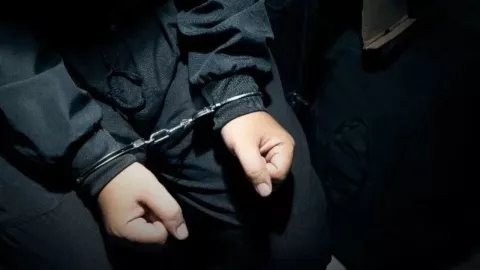 Imagen ilustrativa de persona arrestada