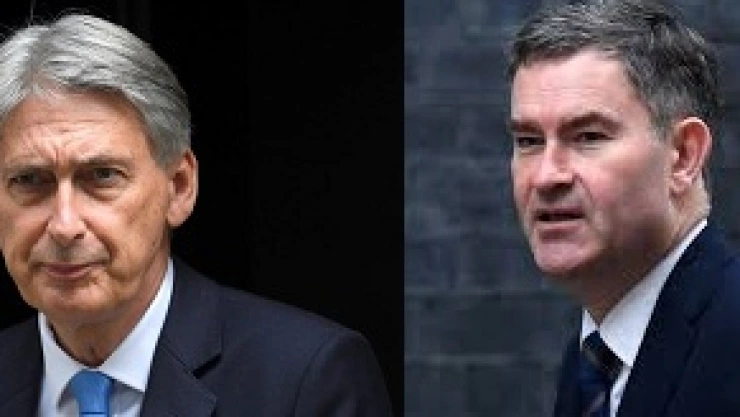 Ministros de Reino Unido Philip Hammond y David Gauke