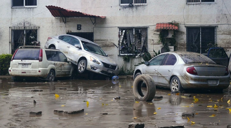 lluvias para febrero 2026, UNAM imagen de autos afectados por inundaciones en Poza Rica, Veracruz