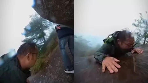 VIDEO Hombre cae por un acantilado en China y vive para contarlo