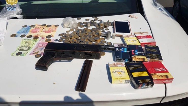 Policías persiguieron a los asaltantes que portaban la subametralladora