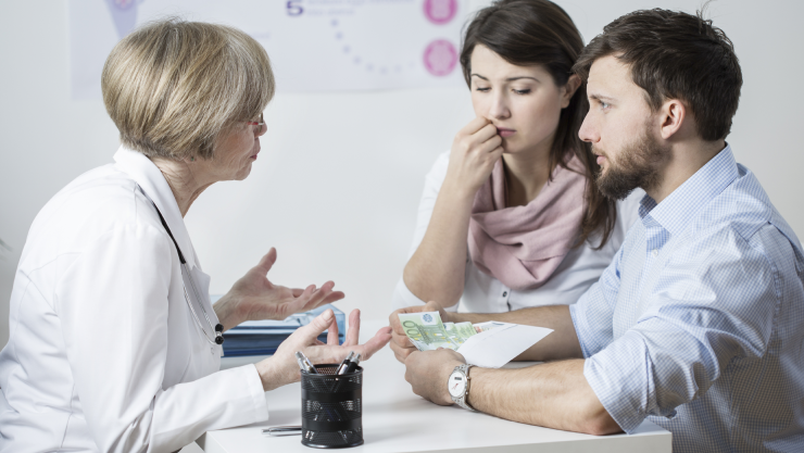 Couple giving a bribe
