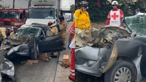 ¡Auto queda aplastado entre dos camiones en la Vía Rápida! 2 mujeres prensadas