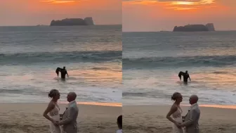Hombre con disfraz de Batman sorprende a pareja de novios en la playa y se hace viral