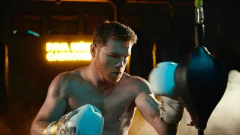 canelo encara a oscar de la hoya.jpg