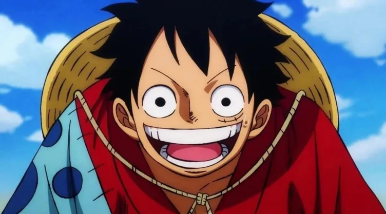 En la imagen aparece Luffy en primer plano sonriendo