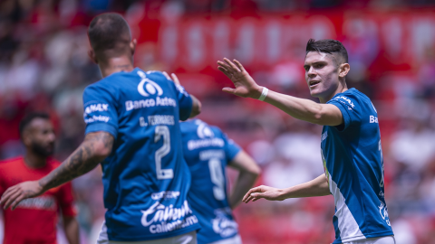 Israel Reyes y Gustavo Ferrareis con Puebla