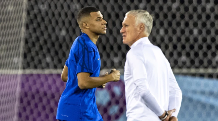 Mbappé y Deschamps