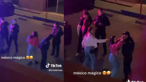 Joven baila con policía.