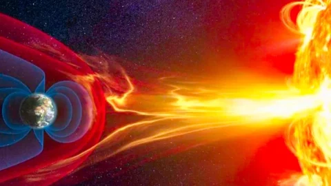 Sol y tierra en tormenta solar 