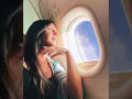 Karla viajando en avión.jpg