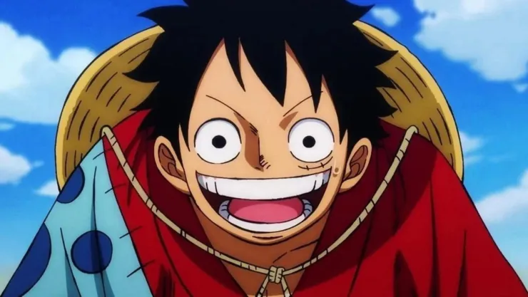 En la imagen aparece Luffy en primer plano sonriendo