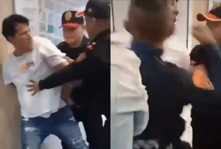 Los policías forcejearon con el hombre al que le fueron colocados los candados de mano.