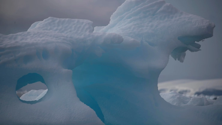 An iceberg floats near Fournier Bay, Antarctica