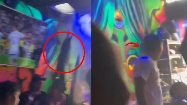 aficionado del Real Macayó del techo de un bar
