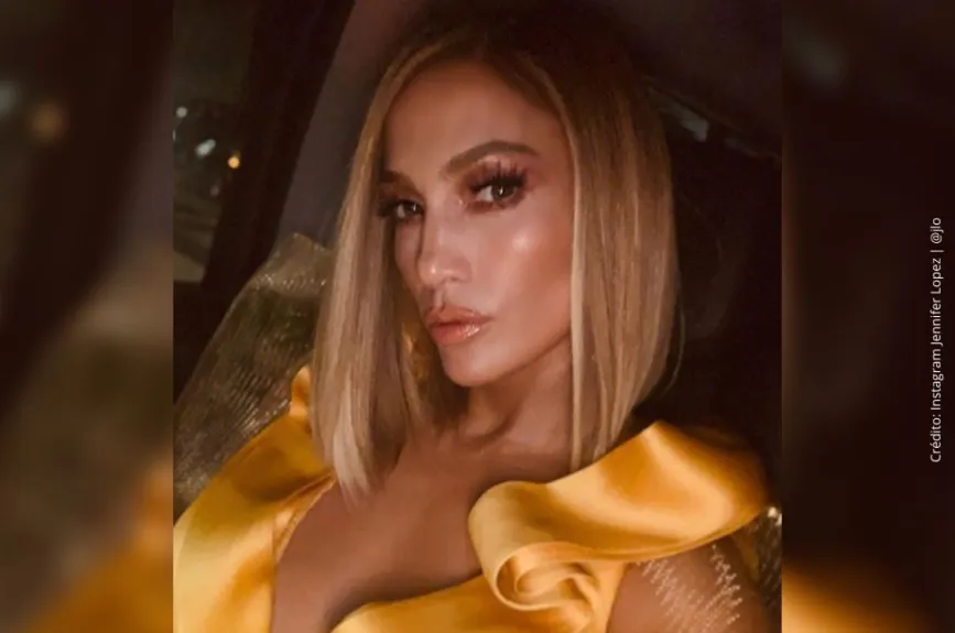 JLo con vestido amarillo..jpg