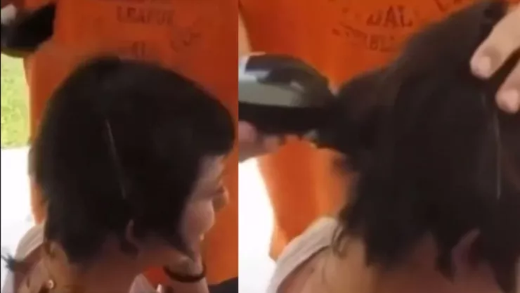 Hombre rapa a su hija
