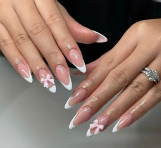modelos de uñas con moños
