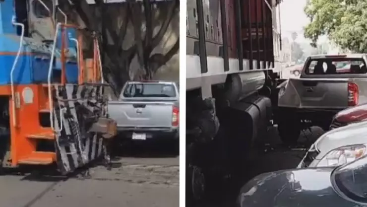 Tren choca autos