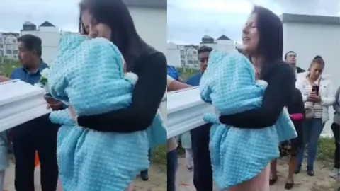Mujer arrulla a su bebé fallecido por última vez