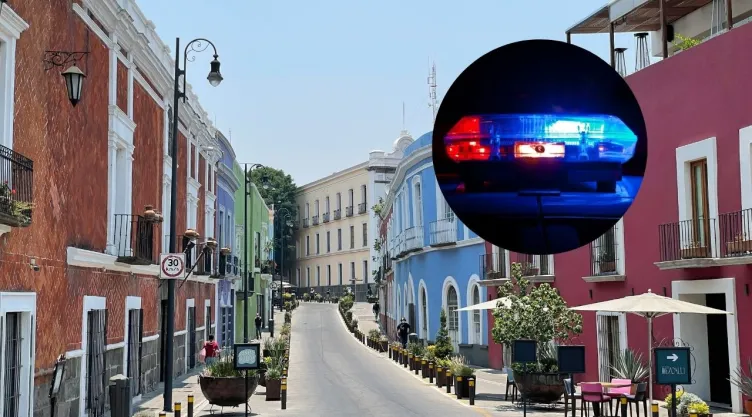 Calle de Puebla y torreta de policía.