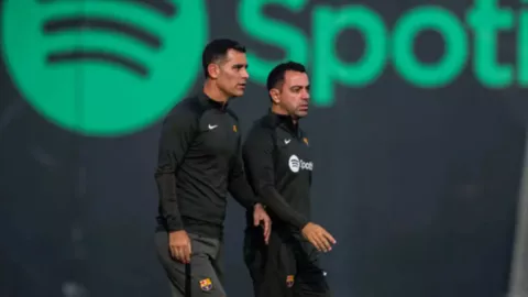 Rafael Márquez y Xavi Hernández