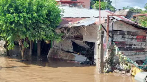 Policía muerto por inundaciones