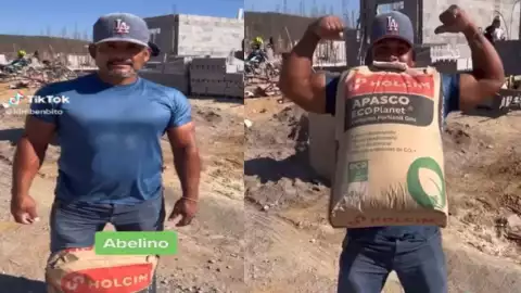 Albañil es capaz de cargar bulto de cemento con los dientes
