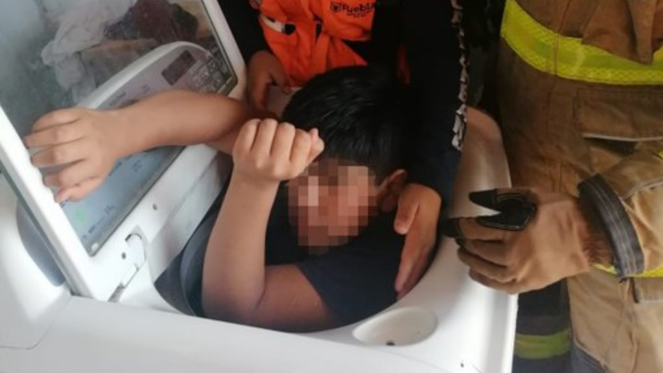 niño-atorado-lavadora.jpg