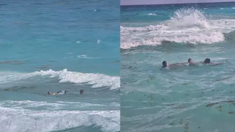 ¡Héroes en el mar! Guardavidas rescatan a dos personas en Playa Delfines en Cancún