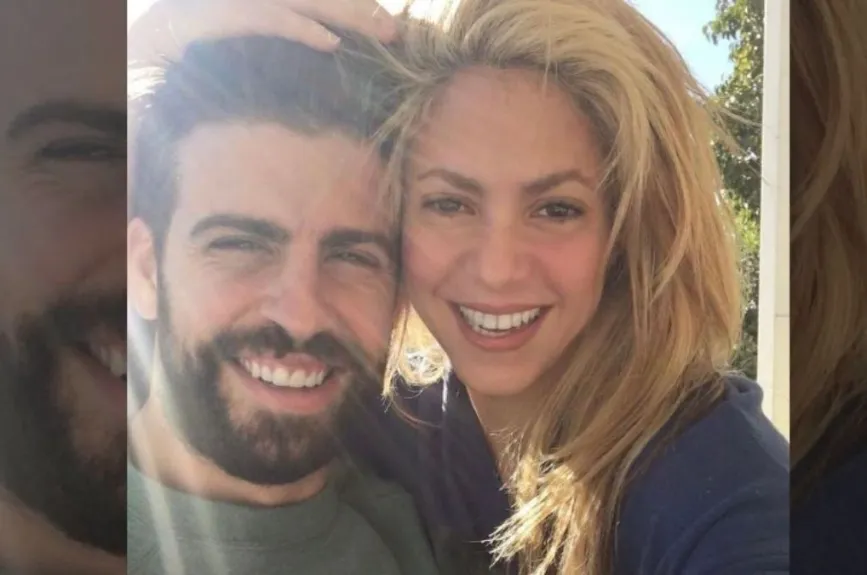 Shakira y Pique sonriendo.jpg