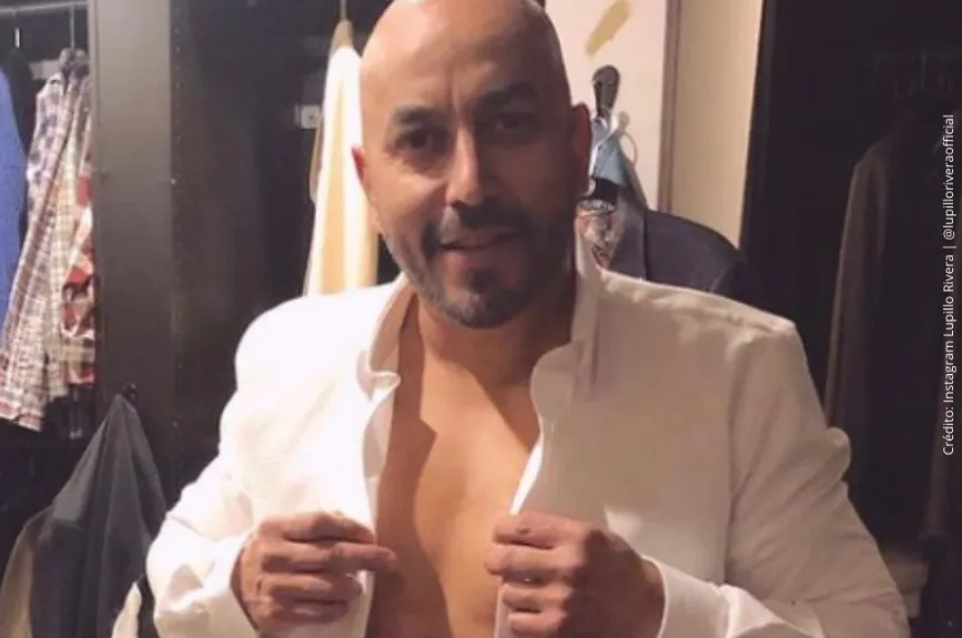 Lupillo Rivera vistiéndose..jpg
