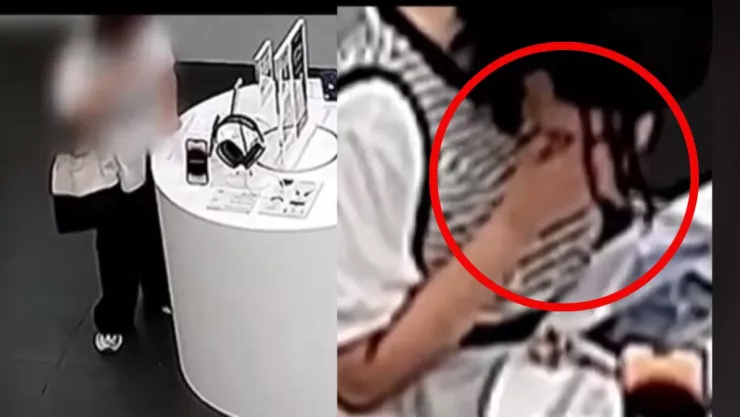 Mujer roba celular a mordidas