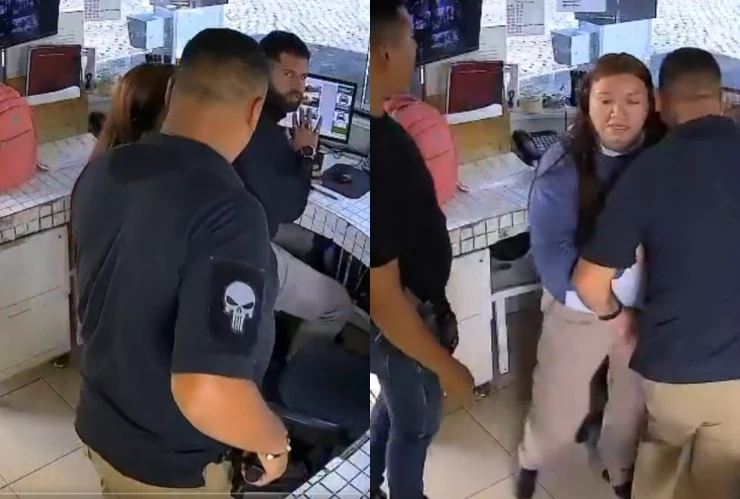 Captura de un video que muestra a 2 escoltas vestidos de negro golpeando a otro hombre mientras una mujer intenta detener la agresión en Zapopan, Jalisco.