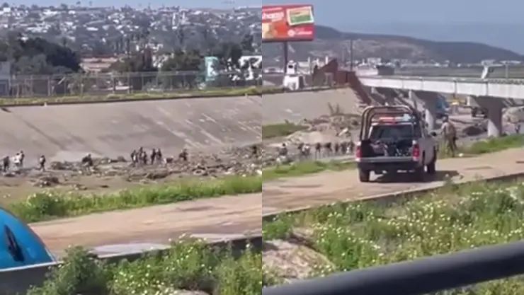 Video cruce masivo de migrantes por río Tijuana