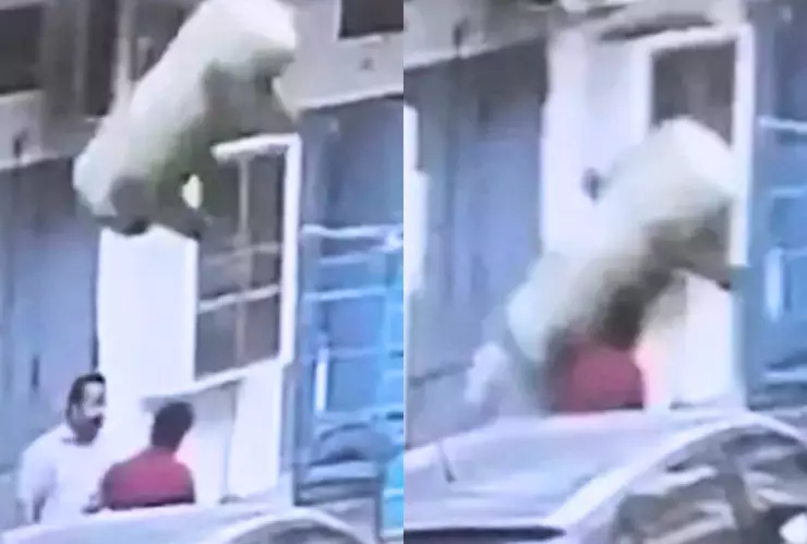 Compresor de aire cae en la cabeza de dos hombres