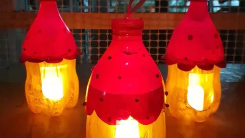 Faroles con botellas plasticas y veladoras de pila.jpg