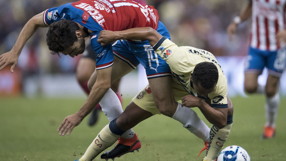 Giovani dos Santos y Antonio Briseño