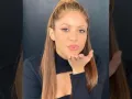 Shakira selfie beso.jpg