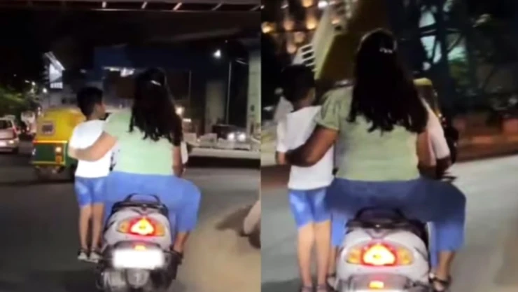 pareja-de-bengaluru-viaja-motoneta-con-niño-parado-en-reposapiés