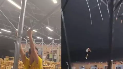 VIDEO Sujetos salen volando junto al techo del restaurante por fuertes vientos en China
