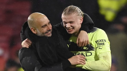 Pep Guardiola y Erling Haaland